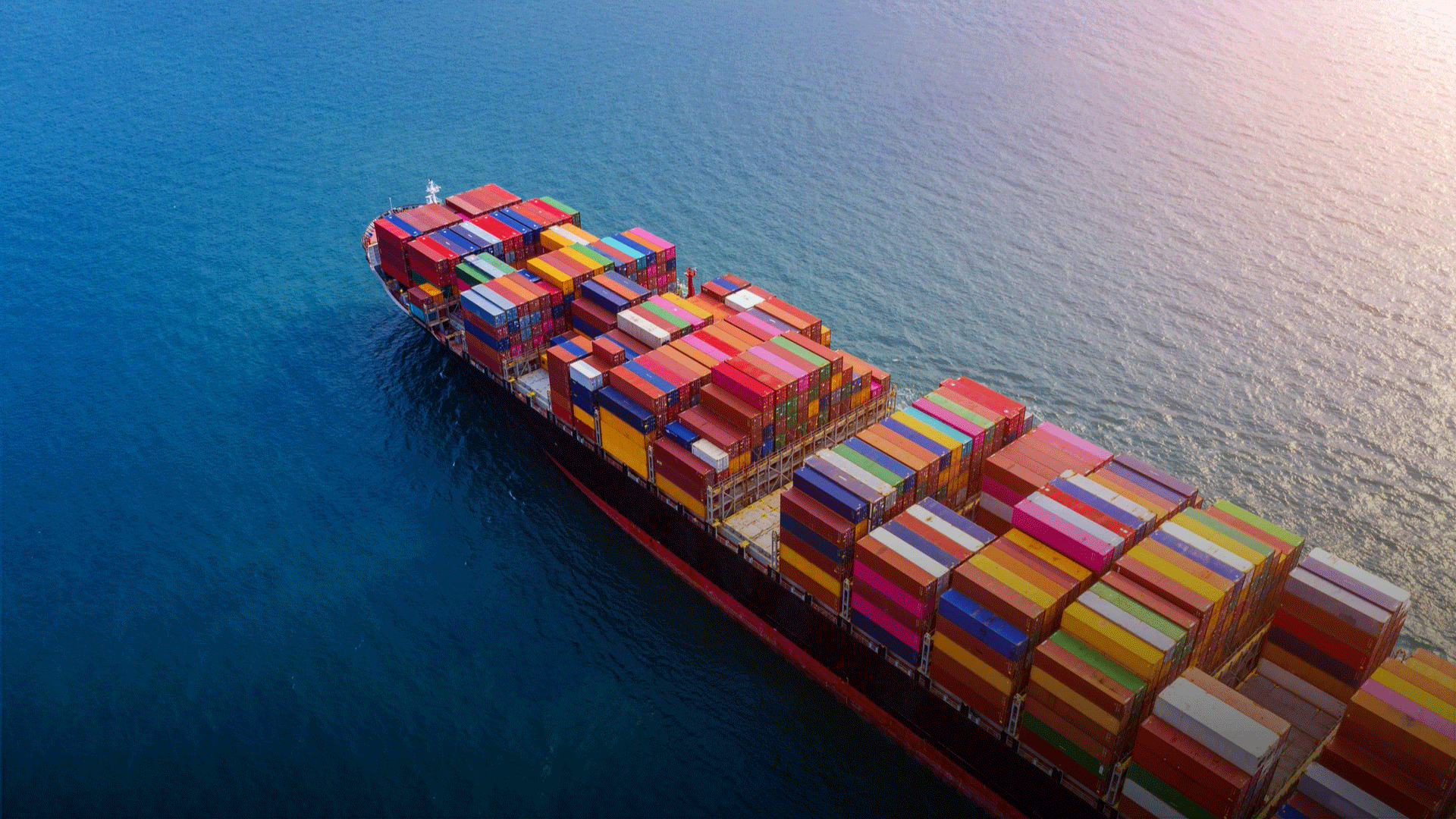 An image of a ship carrying cargo used to represent sustainable shipping.