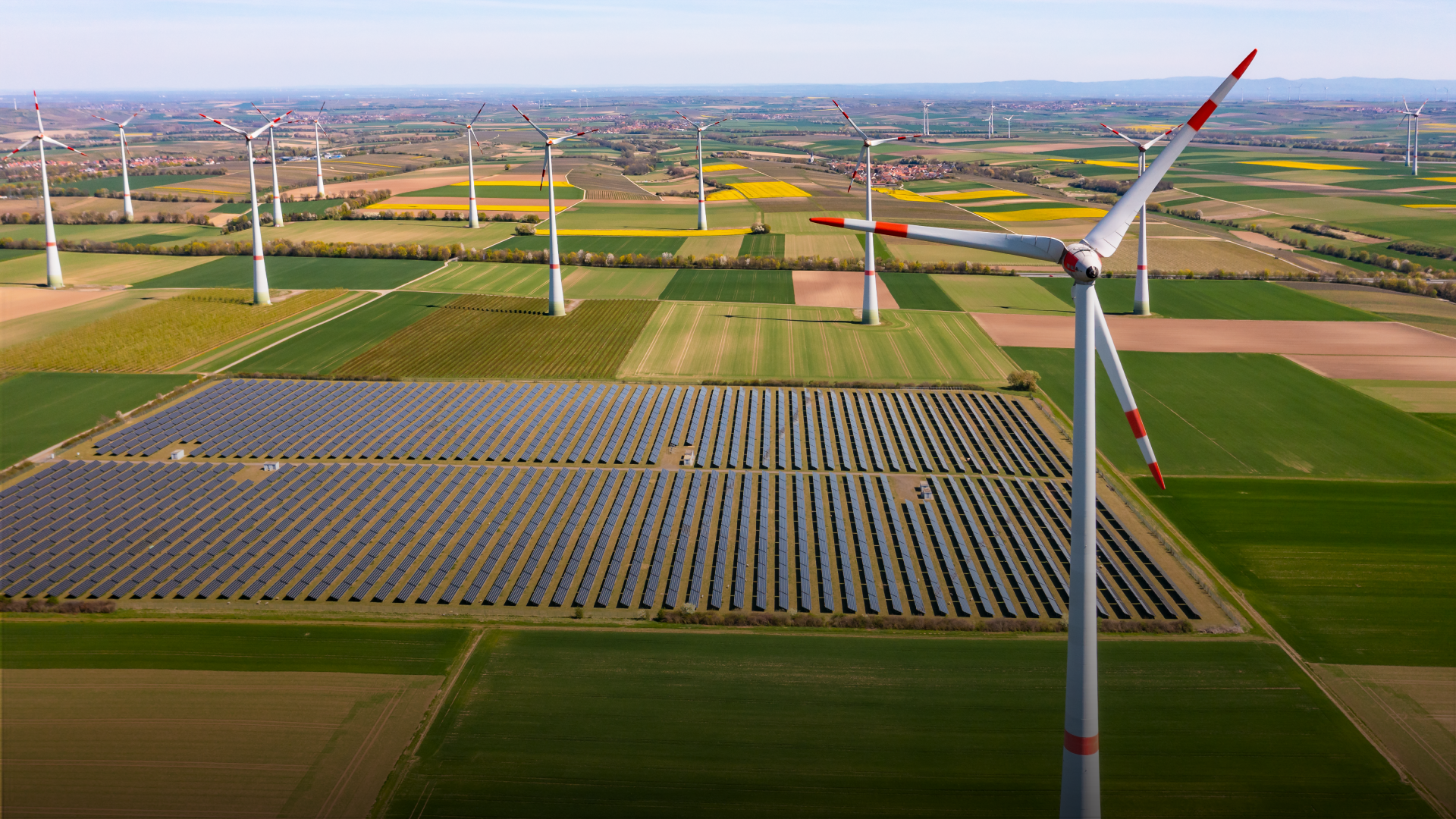 Windmill farm used to represent the renewale energy projects the two sides have collaborated on.